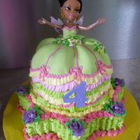 Bratz Pixie Cake MMF + BC at bottom. The doll's body (waist down) was saran wrapped so that the girl had a present to play with after.