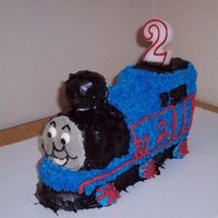 Thomas The Tank Engine Thomas was made using the Wilton Choo-Choo Train pan. I used a pound cake recipe after a collapsing train incident 2 years ago. He's...