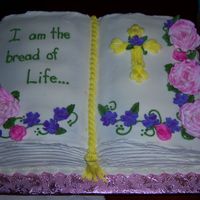 Cake 1 Cake 1 of the Communion cake I made for our twin daughters. Buttercream with fondant/gumpaste mixture flowers. Roses dusted to get pink...