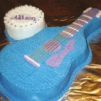 Guitar Birthday Cake Colors picked by little girl--not me, but it turned out really cute. She is a music lover who just started taking lessons. Strings are...
