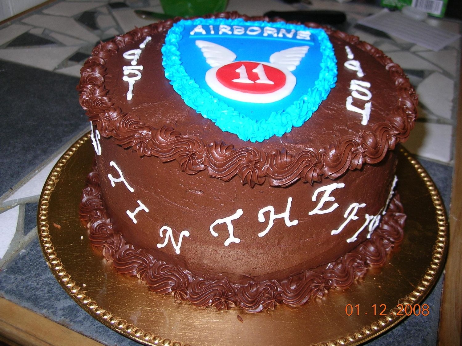11Th Airborne Birthday Chocolate cake w/ chocolate icing. Airborne patch is made of fondant.