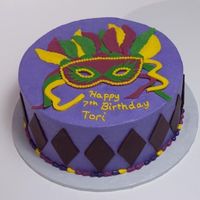 Mardi Gras Birthday Party Buttercream icing with fondant accents