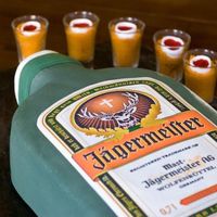 Jagermeister & Jager Bombs Jagermeister cake covered in fondant, with edible image label. The jager bombs are colored cake in real shot glasses. I created smaller...