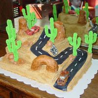 Cars Birthday Cake Copied another CC member (Ishi). Thanks! I was going to use toys for the cars but decided to mold them out of chocolate. I think it turned...