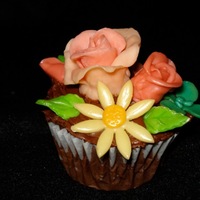 Chocolate Cupcake With Starburst Candy Decorations What kid wouldn't like cupcake decorations made from Starburst candies? Chocolate cupcake has baked cream cheese and coconut filling...