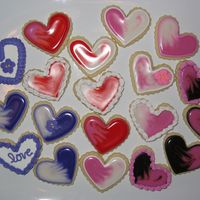 Small Valentine Hearts No-Fail sugar cookies. I used a combination of Toba Garrett's glace icing, antionia74's icing, and royal icing flowers I made...