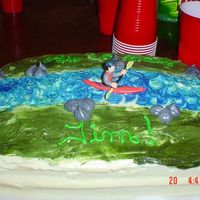 Kayack Cake I made this cake for my husbands birthday. He is heavy into whitewater kayacking. He absolutely loved it. It was a surprise birthday party...
