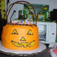 Halloween Birthday Cake For My Friend This is a simple cake to make. It is 3 8" round cakes stacked. I cut a hole in the top for the opening of the trick or treat bucket...