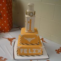 Ut First Birthday Front view is first birthday for a one year old, side view is 2nd birthday for his cousin. Tower is rice krispi treats covered with MMF....