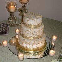 Devils Food Cake With Buttercream Icing And Gold Swirls devils food cake with buttercream icing and gold swirls for small wedding sizes, 10" 8" 6"