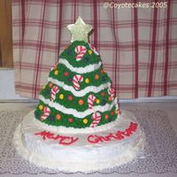 Xmas2005 Here is the xmas tree cake I made tonight for my husbands party at work.