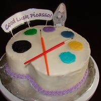 Good Luch Painter's Palette Cake My first carved cake. Made for my sister after applying to an art program. Buttercream covered cake. Picture of her is laminated photopaper...