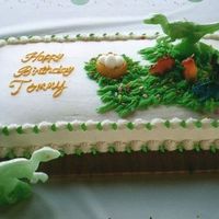 Img044.jpg I made the large dino candles with the grandsons play dough forms. I dusted them with luster dust to give them a shine.