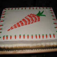 Carrot Cake I made this for my office's March celebration. I tried to go with an Easter theme that wasn't too Eastery. This is crusing cream...