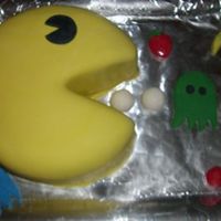 Pac-Man a VERY last minute cake for an 80s "Yurn Back the Clocks" party. Inspired by a CC member. Simple yellow cake with a light...