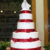 Daughter's Wedding Cake All buttercream icing with red ribbon.