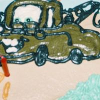 Tow Mater This is my free-handed close-up of my husbands birthday cake. None of the other photos came out but this one. We watched Disney's &...