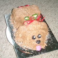 Holly-Day Puppy I did this puppy as a holiday raffle for charity. It was cute and it was fun. The winner ate the whole cake before they left the party they...