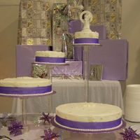 Snowflakes, Beads And Ribbon Wedding Cake The bride asked for snowflakes and ribbon so I made the snowflakes out of fondant using some snowflake molds. You can't tell in the...