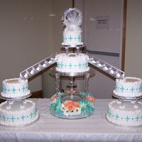 Wedding Cake With Fountain And Staircase This wedding cake was for a friend of mine. It is the first time I used a staircase and I don't think I'm a fan, but it turned...