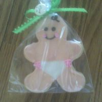 It's A Babygirl! I made this for a babyshower.....used a small gingerbread man cookie cutter and decorated with royal icing.