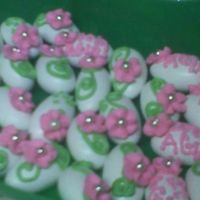 It's A Girl These are Jordan Almonds that I decorated for a babyshower. I made small drop flowers and glued them on with remaining royal icing.......