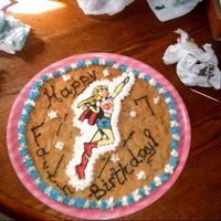 Supergirl Cookie Cake This is my first attempt at decorating. I did this cookie cake for my 7 year old daughter's birthday so that I could practice with the...