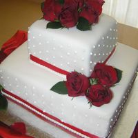 Last Minute Wedding Cake This was my first ever paid cake, and my first stacked wedding cake! I was so excited. I had many near disasters with this and had to...