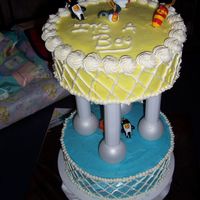 It's A Girl! Spice cake covered with BC frosting. Forgot to cut the tiers down, so the cake was a bit "HIGH".. LOL..