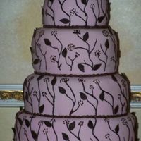 My 1St Wedding Cake The bride had given me a picture of the Confetti Cakes pink and brown embroidered wedding cake to make. This is my interepretation. Dark...