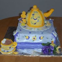 Tea Time This is my first teapot cake. The teapot, tea cup, and base are all made out of cake. This took me so many hours.