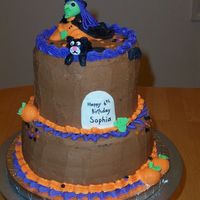 A Halloween Birthday This cake was created based on the characteristics that a 6 year old girl requested for her birthday. She loved it!
