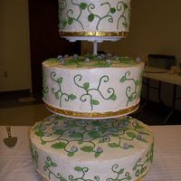 Vine Cake With Crystallized Blueberries This cake was for a 55th wedding anniversary. It is mock whipped cream icing with royal icing vines and leaves with crystallized...