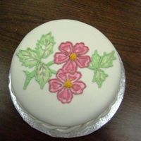 Fondant Covered Cake With Brush Embroidery This was my first fondant covered cake. I made it in my intermediate level class. We used the brush embroidery technique for the flowers...