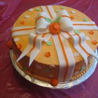 Gift Wrap All BC with fondant bow and flower.