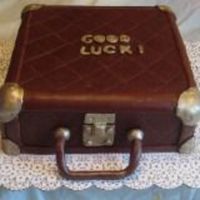 Suitcase/luggage Cake This was done for a " Going away" party. The client wanted a very antique, old feel to the suitcase. This was my first attempt at...