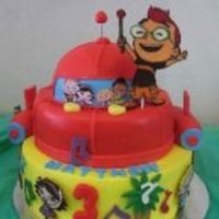 Little Einstein Cake covered in fondant and characyers are chocolate transfers.