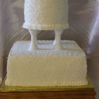 Round And Square This cake is Vanilla with strawberries and cream filling (top) and Vanilla with custard filling (bottom) frosted with vanilla butter cream...