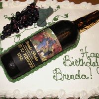 50Th Birthday Cake First attempt at a fondant wine bottle, but in a time crunch, so I used plastic grapes...