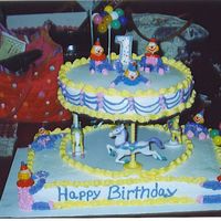 Carousel Cake I wanted to do something special for my niece's 1st birthday, she loved the cake! I had alot of fun doing it!
