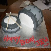Drums Made this for a friend's son's 15th birthday. The cake is a chocolate cake with a swiss meringue buttercream. The drum sticks are...
