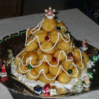 Piece Montee Christmas Tree This is a traditional French "cake" made with a mountain of cream stuffed profiteroles. The whole thing is put together with...