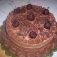 Three Chocolate Cake This cake is made with milk chocolate, mocha, and dark chocolate ganache.