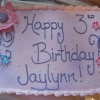 Sparkles Customer wanted cake for 3 year old and only said she liked pink and purple. I love it when I have so much freedom on a cake! Flowers are...