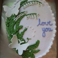 Butterflies And Lily Of The Valley Made a cake for my Grandma with her favorite things: Purple, Lily of the Valley and Butterflies.