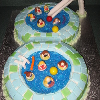 Swimming Pool Party I made this cake in 5 hours! Yikes!! I made each of my daughter's friends out of fondant. You could tell who they were by their...