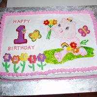 Care Bears First Birthday My daughters first brithday cake, with care bears and hugs and stitches. The cake is icecream cake, and i used rolled out icing to do the...