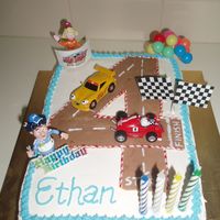 Roary Racing Car Birthday Cake Roary racing car cake, The number 4 (track) made from chocolate and used roary figurines for decoration. (my son wanted Roary - very HTF)