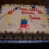 100_0391.jpg This was done for a July 4th birthday. Customer wanted firecrackers or fireworks. The complete top is frozen buttercream transfer. It was...