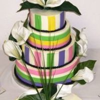 Yvette Iced in BC with fondant accents & silk flowers.